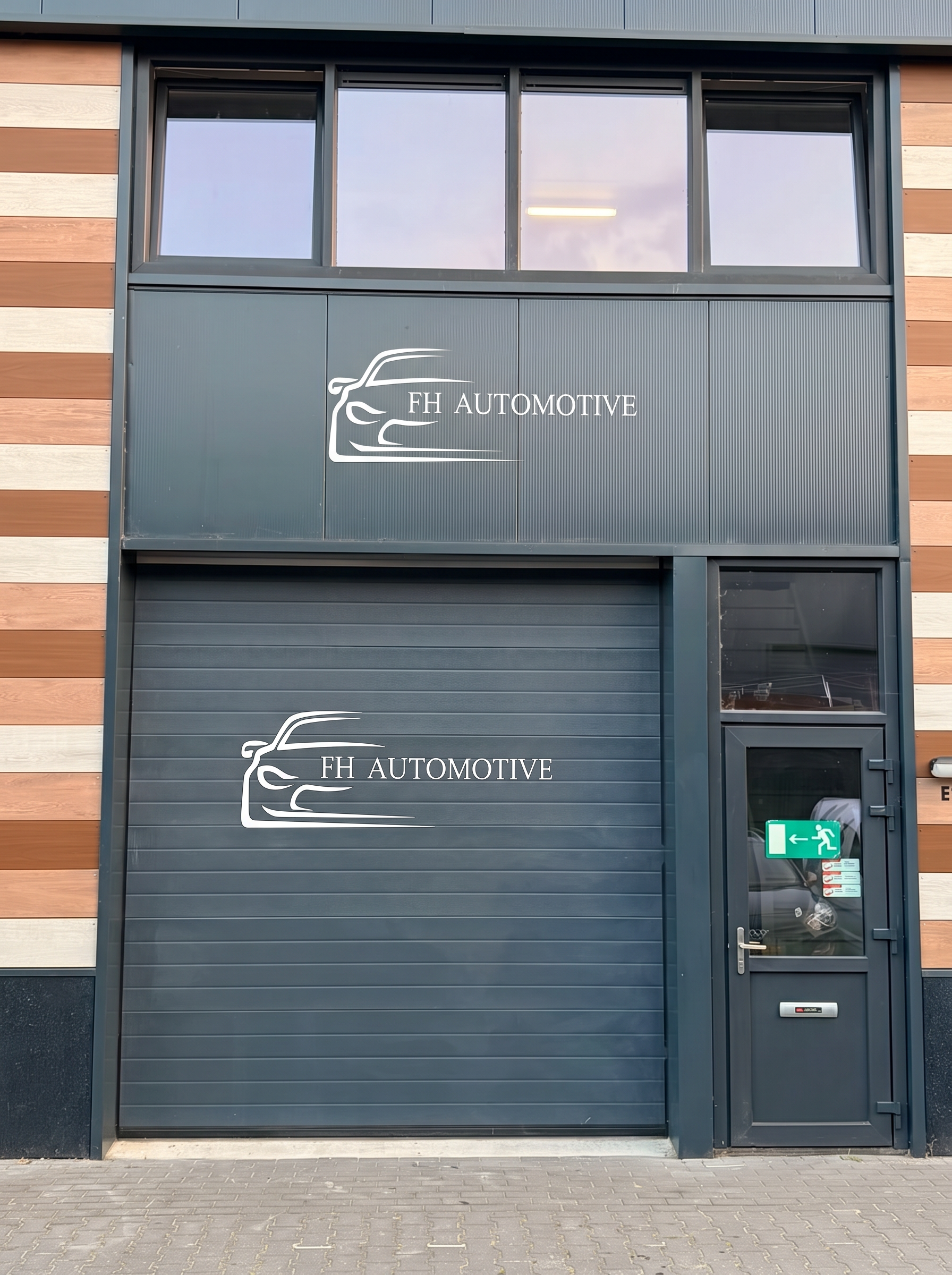 Bedrijfspand van FH Automotive aan de Marconiweg in Nunspeet met logo op de gevel